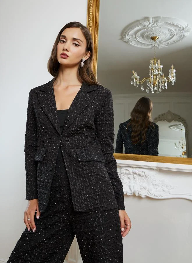 ستايلي بليزر جاكار بقصة عادية وتفاصيل جيوب